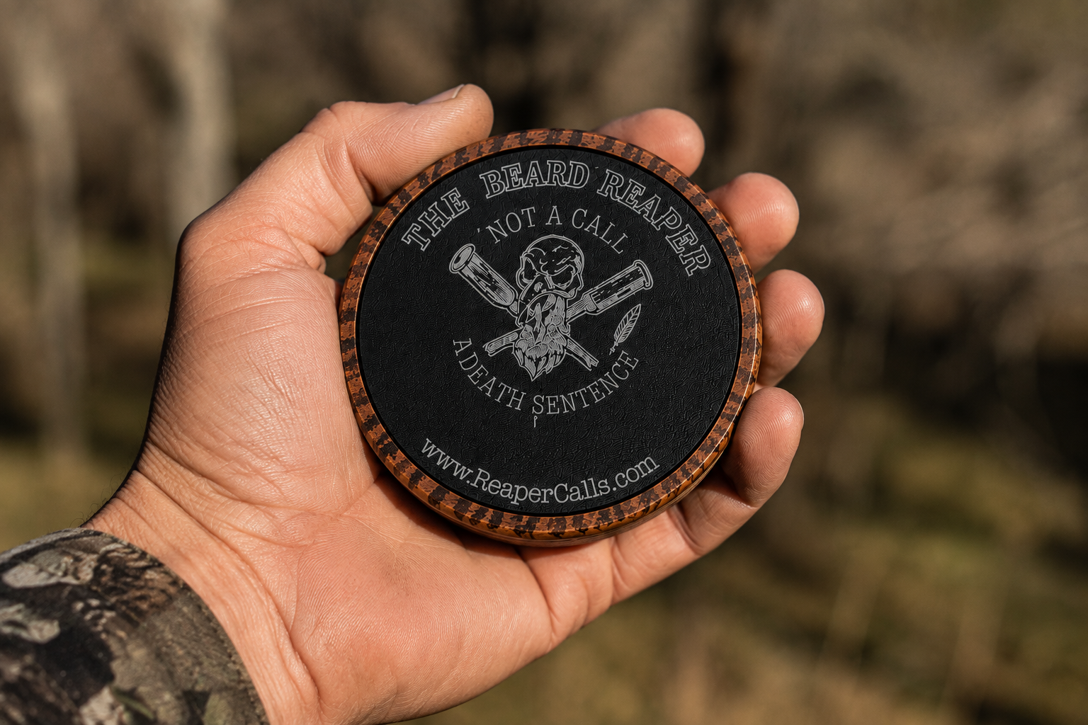 A hunter holding the Beard Reaper pot call
